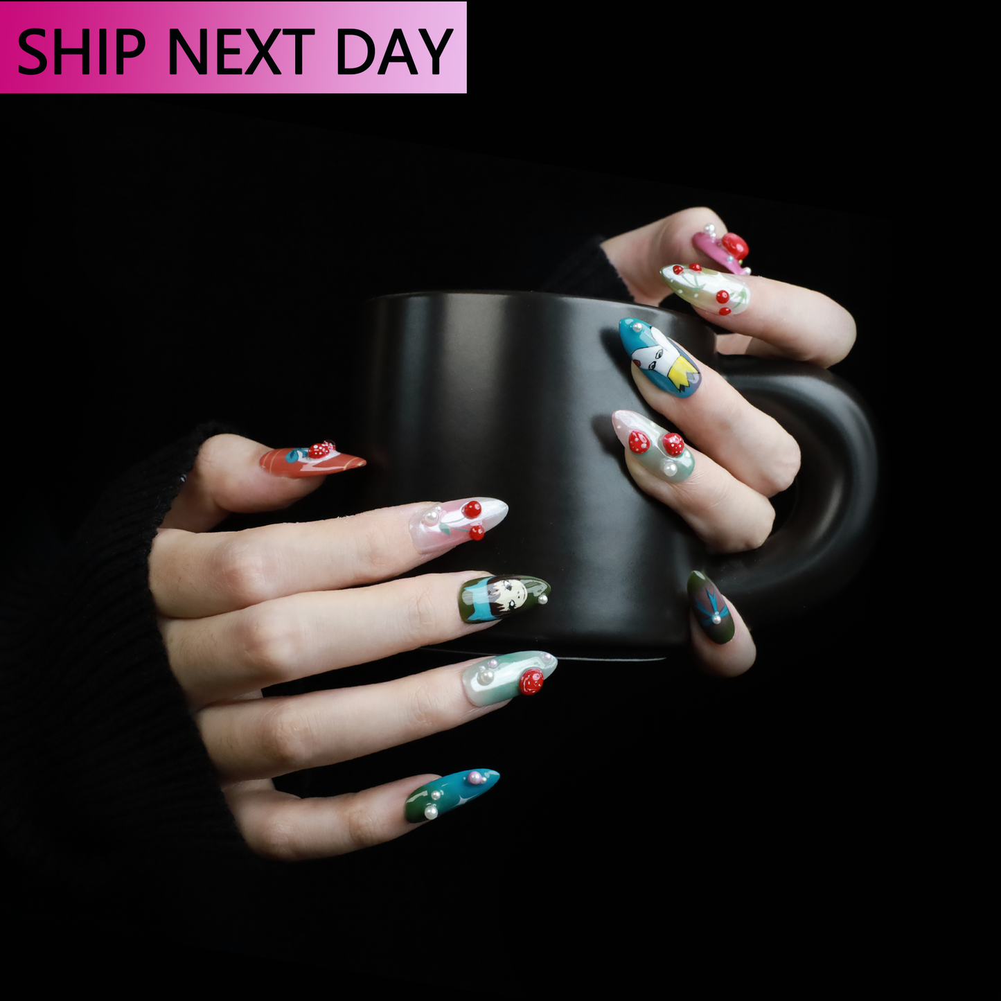Someone with long, intricately painted 3D cartoon Blossom Bliss Press-On Nails by We Do Nails holds a black mug against a dark background. In the top left corner, a pink box reads SHIP NEXT DAY.