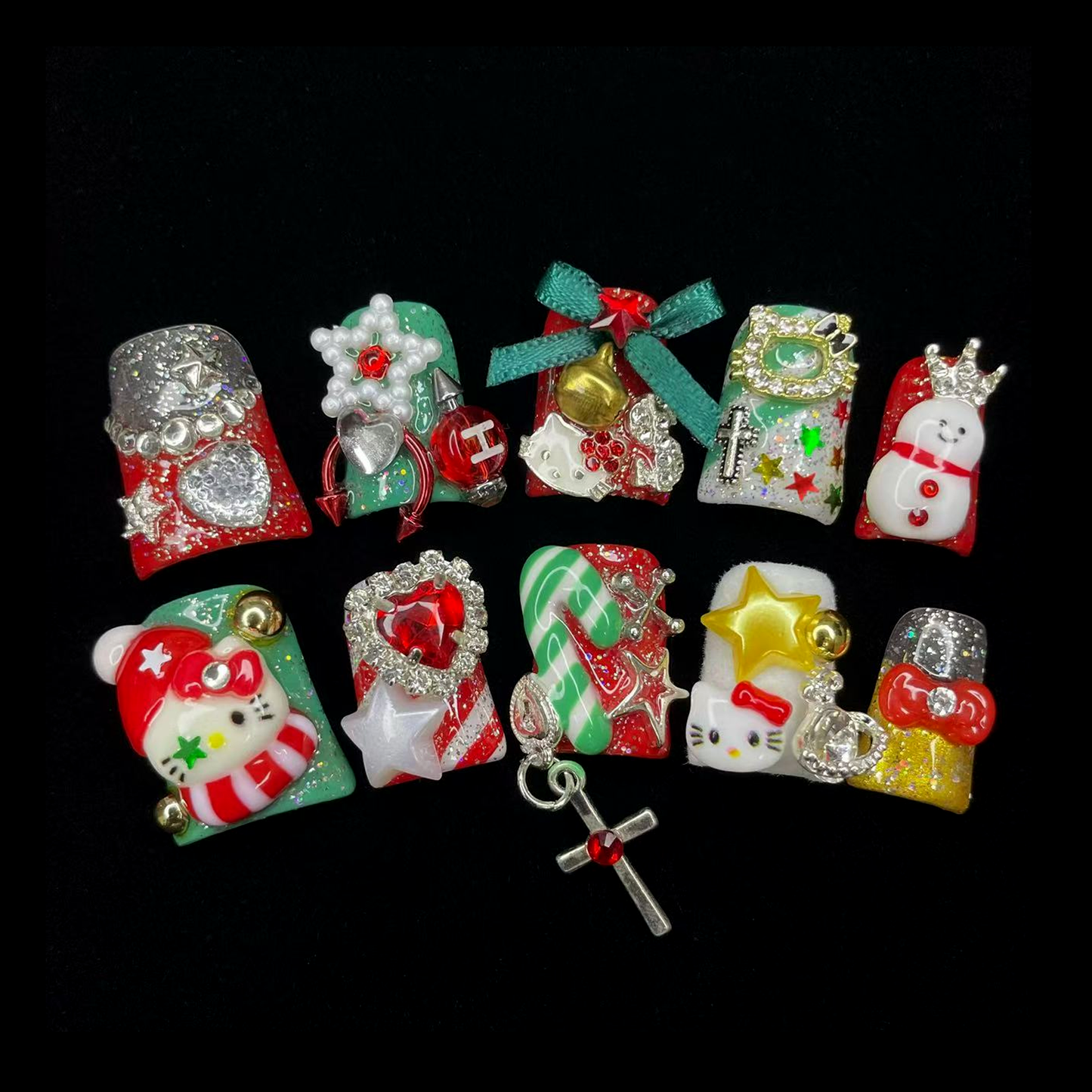 Embrace the season with We Do Nails Luxurious Christmas Short Duck Press-On Nails, featuring handmade 3D art of snowmen, Santa, and candy canes. Adorned with bows, stars, and a cross charm on a chic black background.