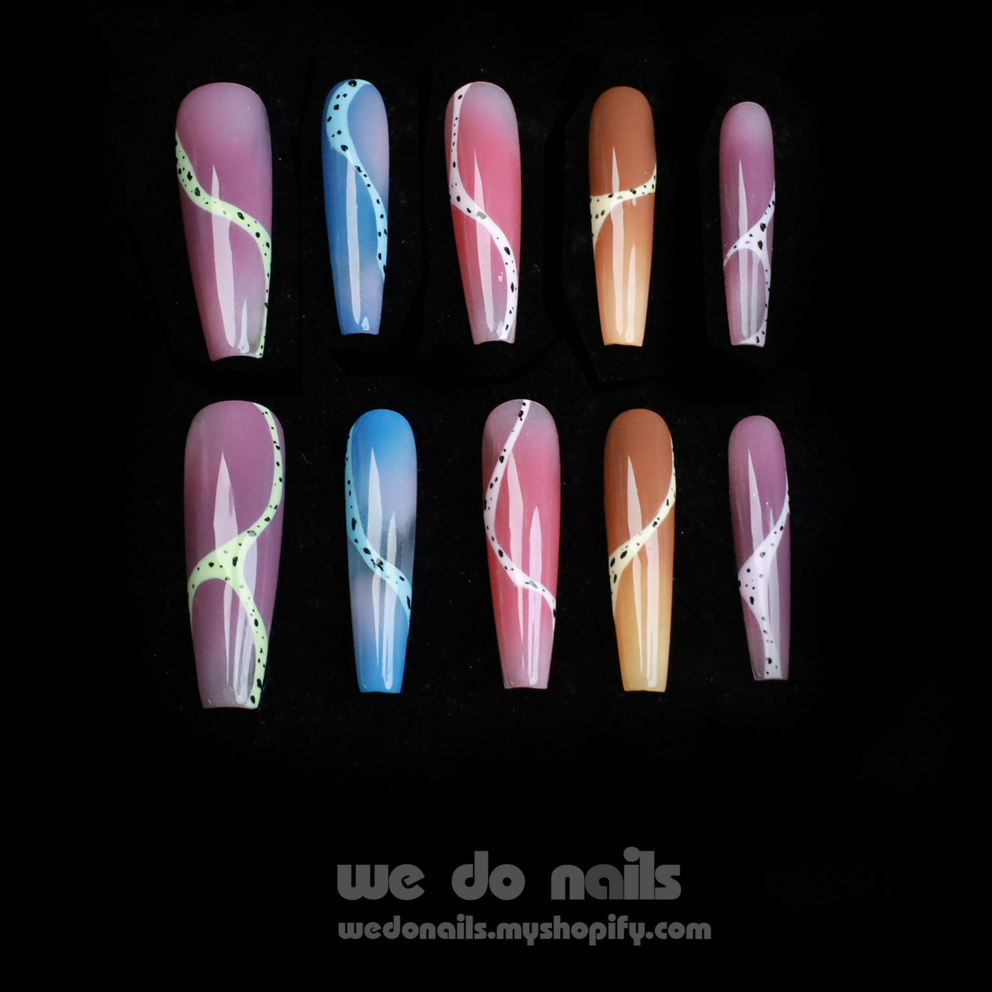 A hand adorned with Milky Rainbow Press-On Nails exhibits a smooth gradient and dotted 3D designs against a black background. The text We Do Nails appears alongside the website link, emphasizing the brands artistry.