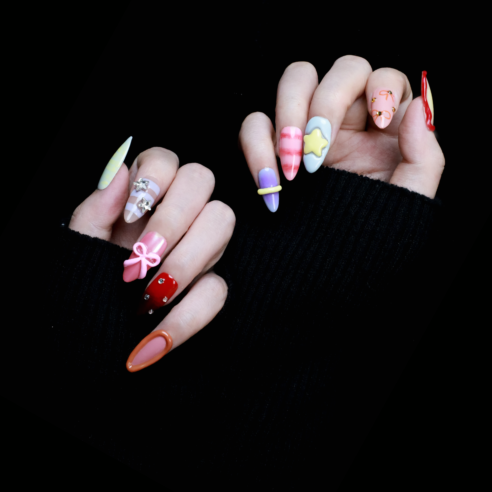 A hand with We Do Nails Candyland Dream Press-On Nails displays playful designs. Features include pastel yellow plaid, clear nails with bows and rhinestones, pink nails with a bow, shiny red with rhinestones, and glossy rust-orange—all set against a dark backdrop.