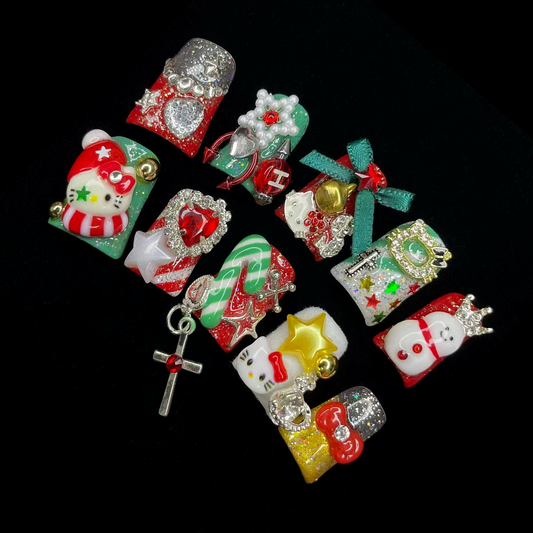 Embrace the season with We Do Nails Luxurious Christmas Short Duck Press-On Nails, featuring handmade 3D art of snowmen, Santa, and candy canes. Adorned with bows, stars, and a cross charm on a chic black background.